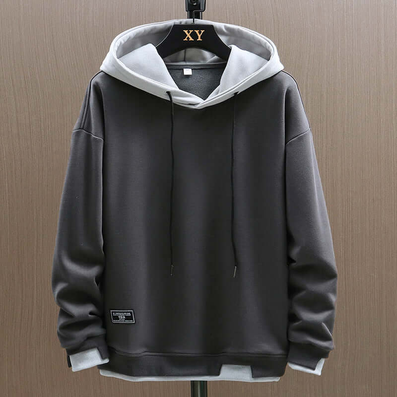 Stylish men's colorblock hoodie, two-tone design, ultimate comfort for modern streetwear & casual wear.