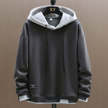 Stylish men's colorblock hoodie, two-tone design, ultimate comfort for modern streetwear & casual wear.