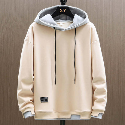 Modern men's two-tone hoodie, relaxed fit pullover, ideal for comfort, casual wear, and everyday style.