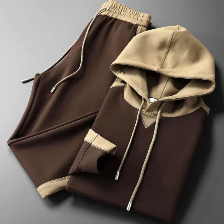 Stylish men's two-tone casual set. Versatile joggers & crewneck for athleisure or relaxation.
