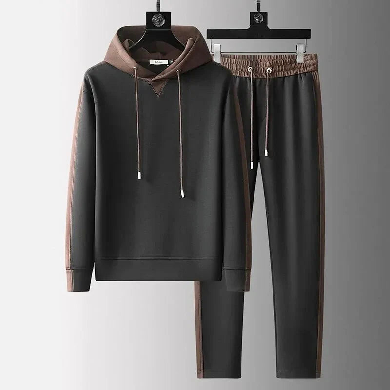 Effortless men's two-tone lounge set. Stylish crewneck top and joggers for ultimate comfort.