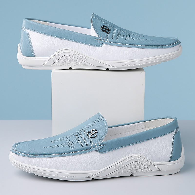 Smart casual men's two-tone loafers with an easy slip-on design for convenience.