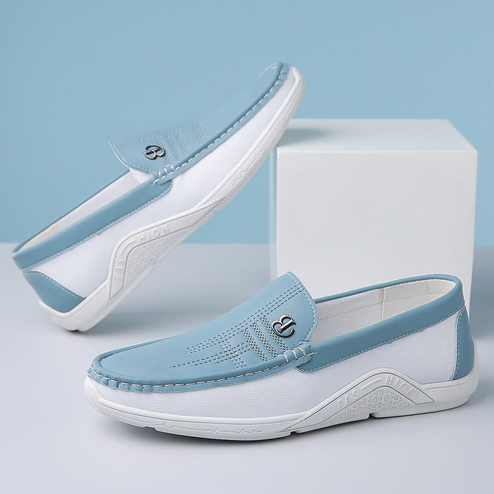 Luxurious two-tone men's loafers, comfortable slip-on dress shoes for elegance.