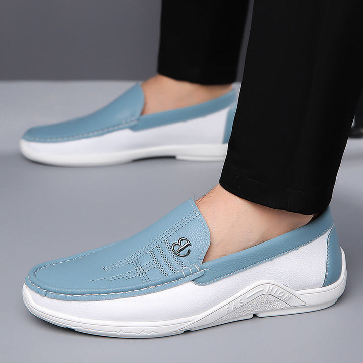 Stylish men's two-tone loafers, slip-on for elevated fashion and sophisticated look.