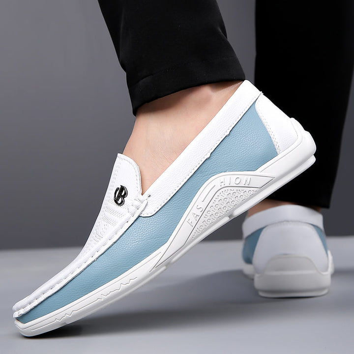 Sophisticated men's slip-on loafers, two-tone comfort footwear for modern men.