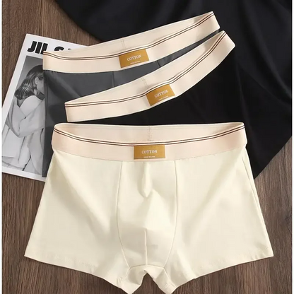 Three-pack of men's no-roll boxer briefs. Mid-rise, sweat-wicking design for ultimate comfort and active wear.