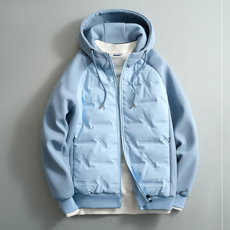 Close-up of ultimate men's puffer hoodie, highlighting insulated design for warmth & comfort. Ideal winter layering piece.