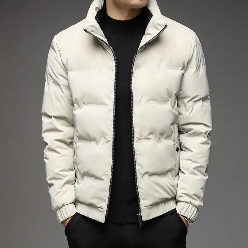 Black Men's Ultimate Warmth Puffer Jacket. Sleek & warm insulated winter coat for cold weather outerwear.