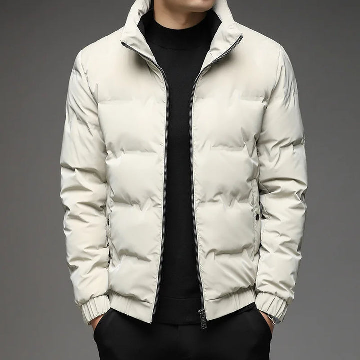 Black Men's Ultimate Warmth Puffer Jacket. Sleek & warm insulated winter coat for cold weather outerwear.