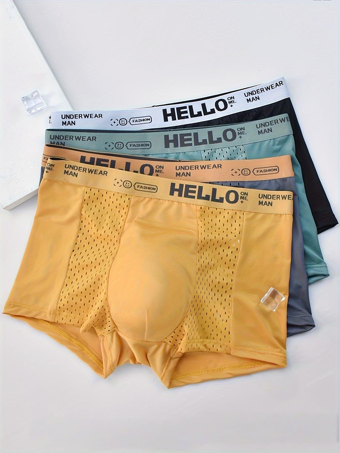 Close-up of ultra-breathable mesh fabric on men's boxer briefs, showcasing quick-dry & sweat-wicking.