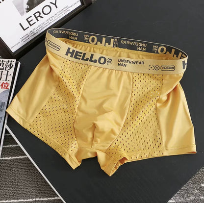 Man wearing ultra-breathable mesh boxer briefs, perfect for activewear and all-day comfort.