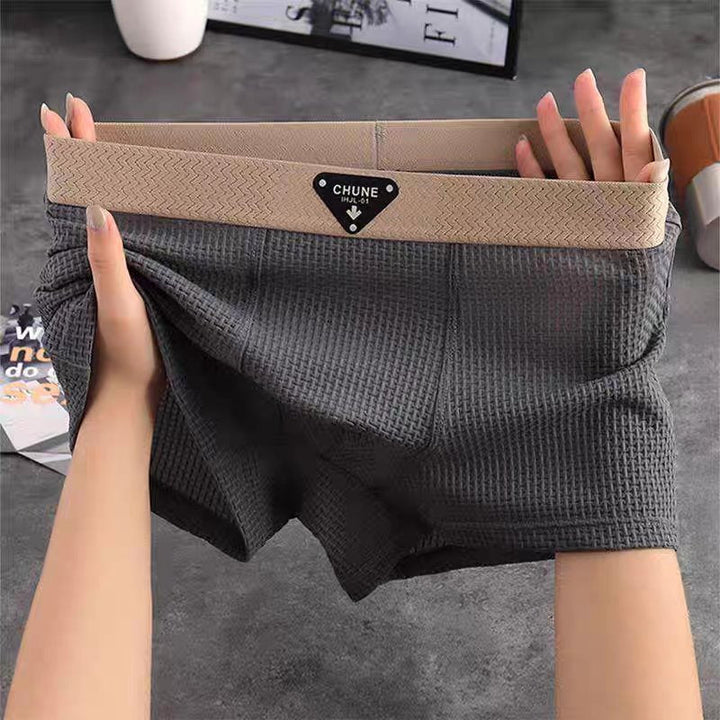 Relaxed men's boxer loungewear, ideal for comfortable sleepwear and casual lounging at home.