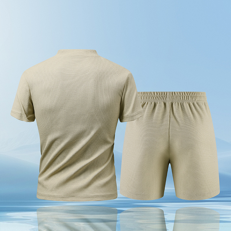 Stylish men's quarter-zip Piqué top, part of a breathable lounge set for ultimate comfort.