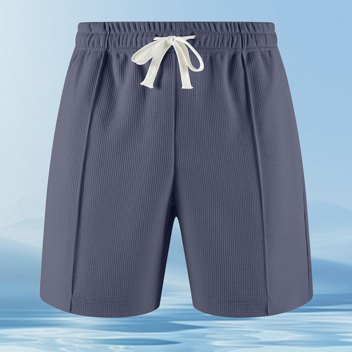 Complete men's two-piece Piqué lounge set, offering ultra-comfort, breathability & modern style.