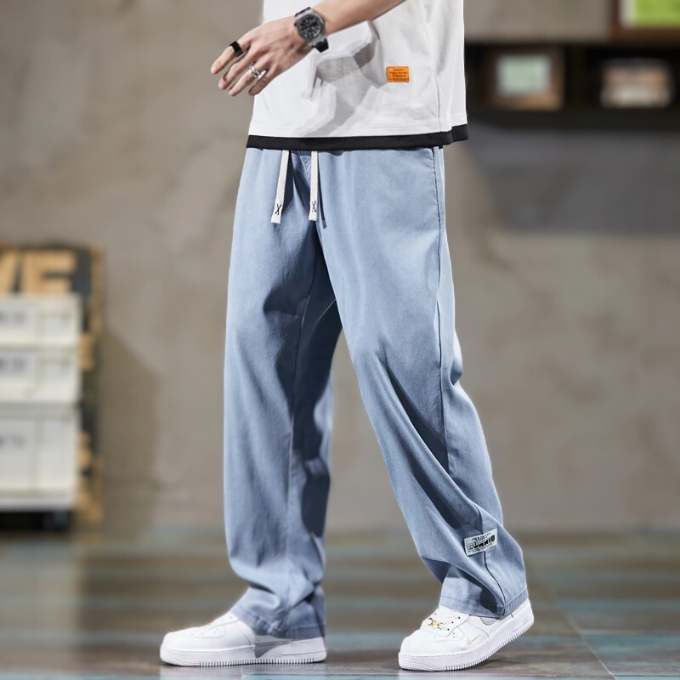 Men's drawstring lounge pants, relax-fit for ultimate comfort. Features elastic waist & straight leg.