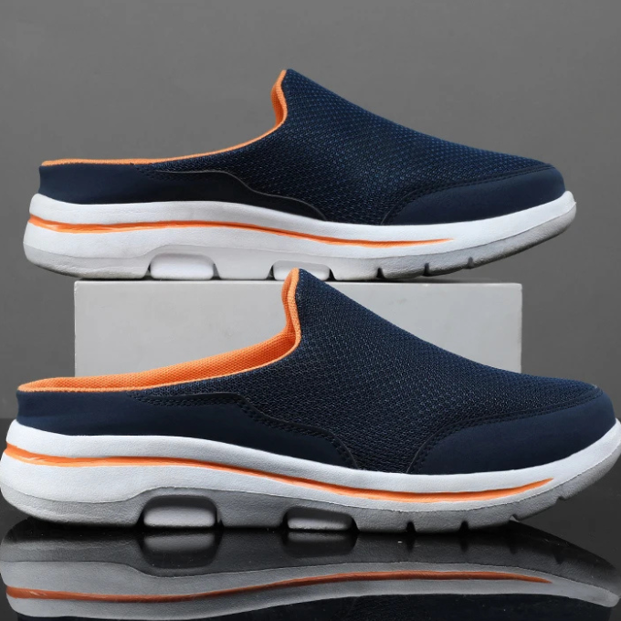 Side profile of men's ultra-comfort slip-on sneaker slides, showing breathable design & easy wear.