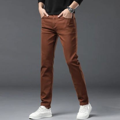 Dark wash men's stretch denim jeans, wrinkle-resistant and comfortable for everyday style.