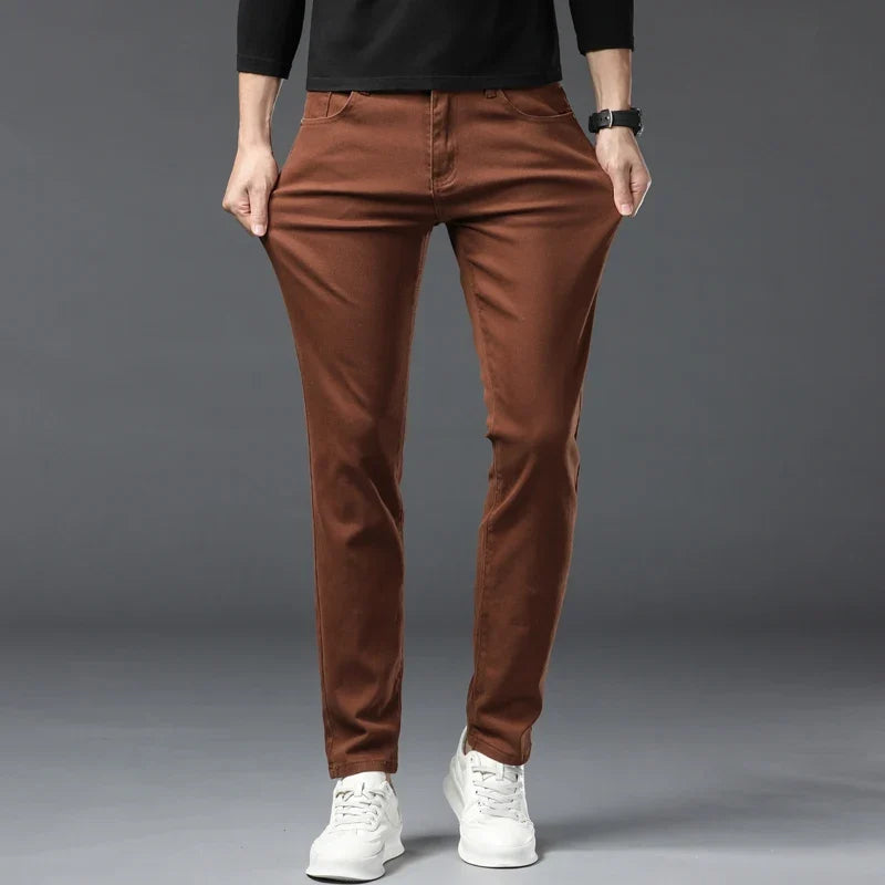 Man wearing comfortable stretch denim jeans, ideal for active casual wear & flexible movement.