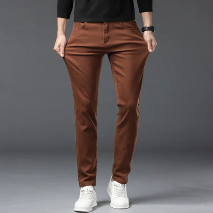 Man wearing comfortable stretch denim jeans, ideal for active casual wear & flexible movement.