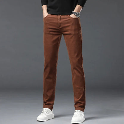 Close-up of comfortable stretch denim fabric on men's jeans, highlighting flexibility & quality.