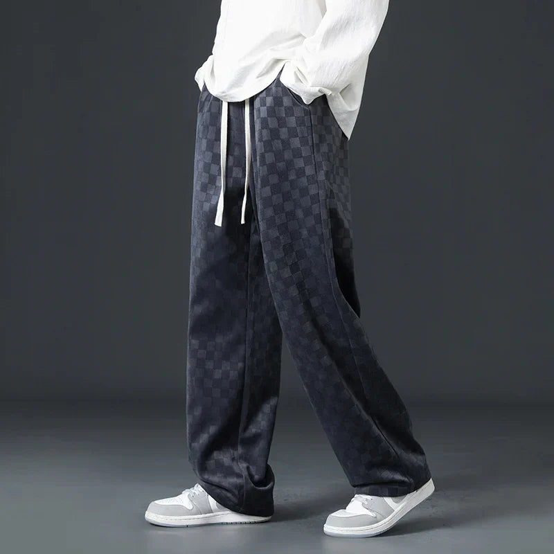 Relaxed fit men's black sweatpants, ideal for casual wear, featuring ultimate comfort and a modern look.