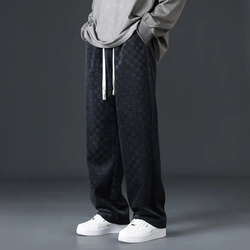 Black men's comfortable sweatpants, offering ultimate relaxed fit for lounge wear, casual outings & style.