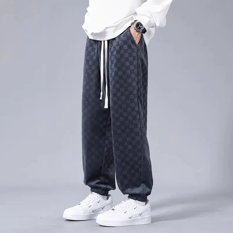 Ultra-comfortable men's black relaxed fit sweatpants, perfect lounge wear for casual style & all-day comfort.