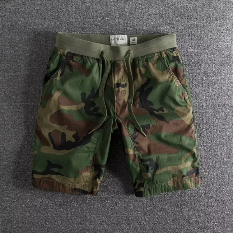 Men's ultra-soft camo athletic shorts for gym, workout & casual wear. Flexible design for unrestricted movement.