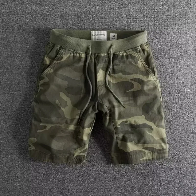 Comfortable men's camo workout shorts. Ultra-soft fabric, ideal for gym, running, or flexible summer activities.