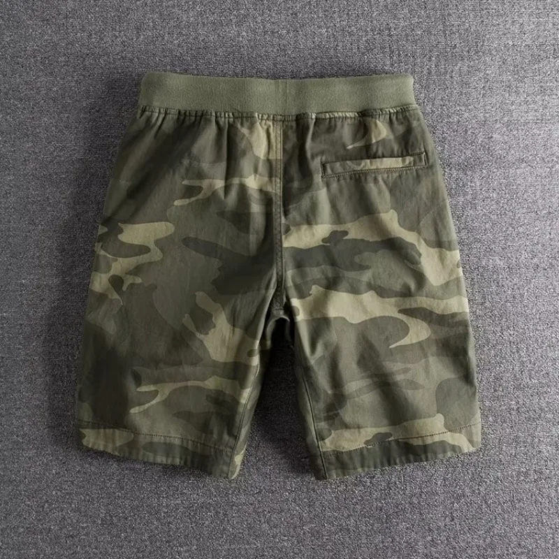 Durable men's tactical camo shorts. Ultra-soft athletic wear, perfect for gym training, sports & outdoor adventure.