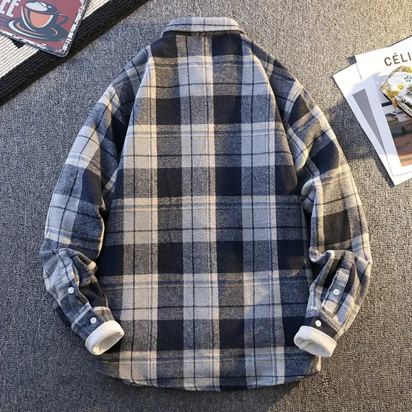 Men's casual plaid button-up shirt with rolled sleeves, showing comfort & versatile style.