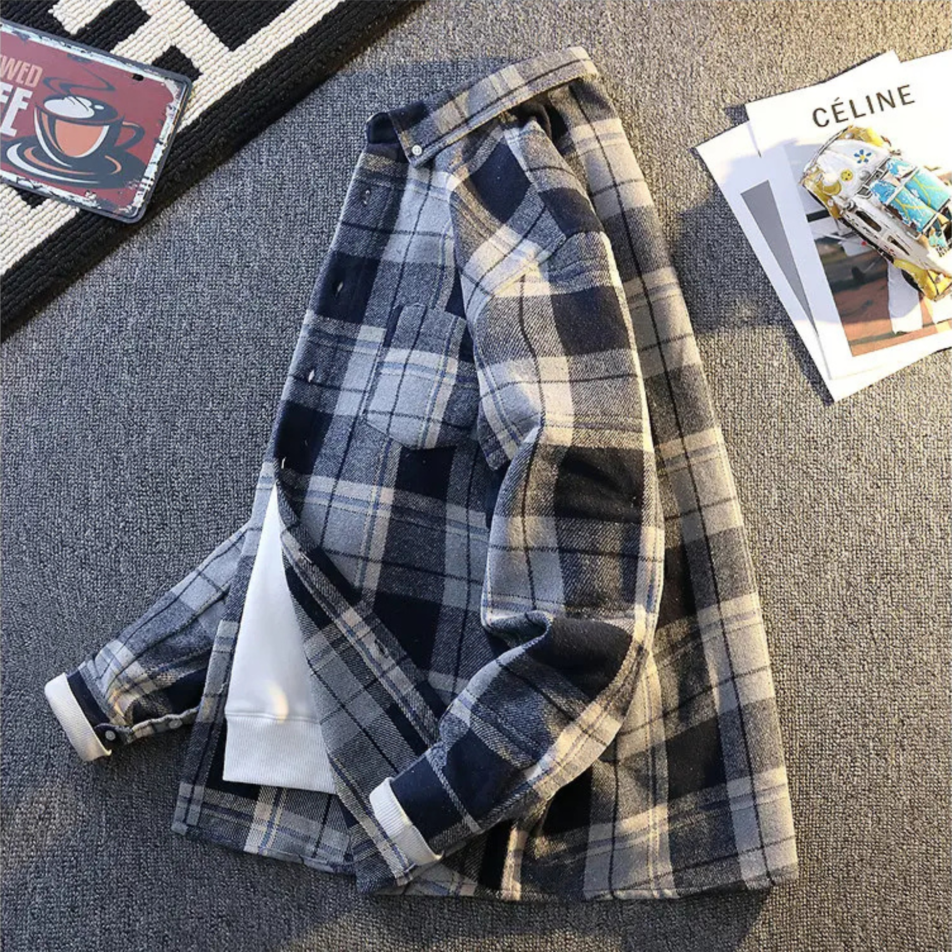 Men's ultra-soft plaid long sleeve shirt worn unbuttoned over a tee for casual layering.
