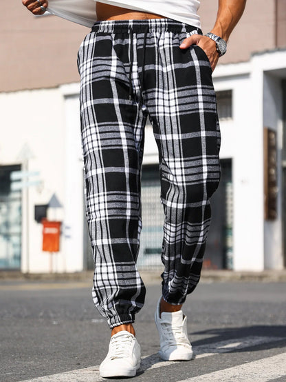 Men's comfortable plaid joggers. Ultra-soft flannel, tapered fit, ideal for street or home lounge.