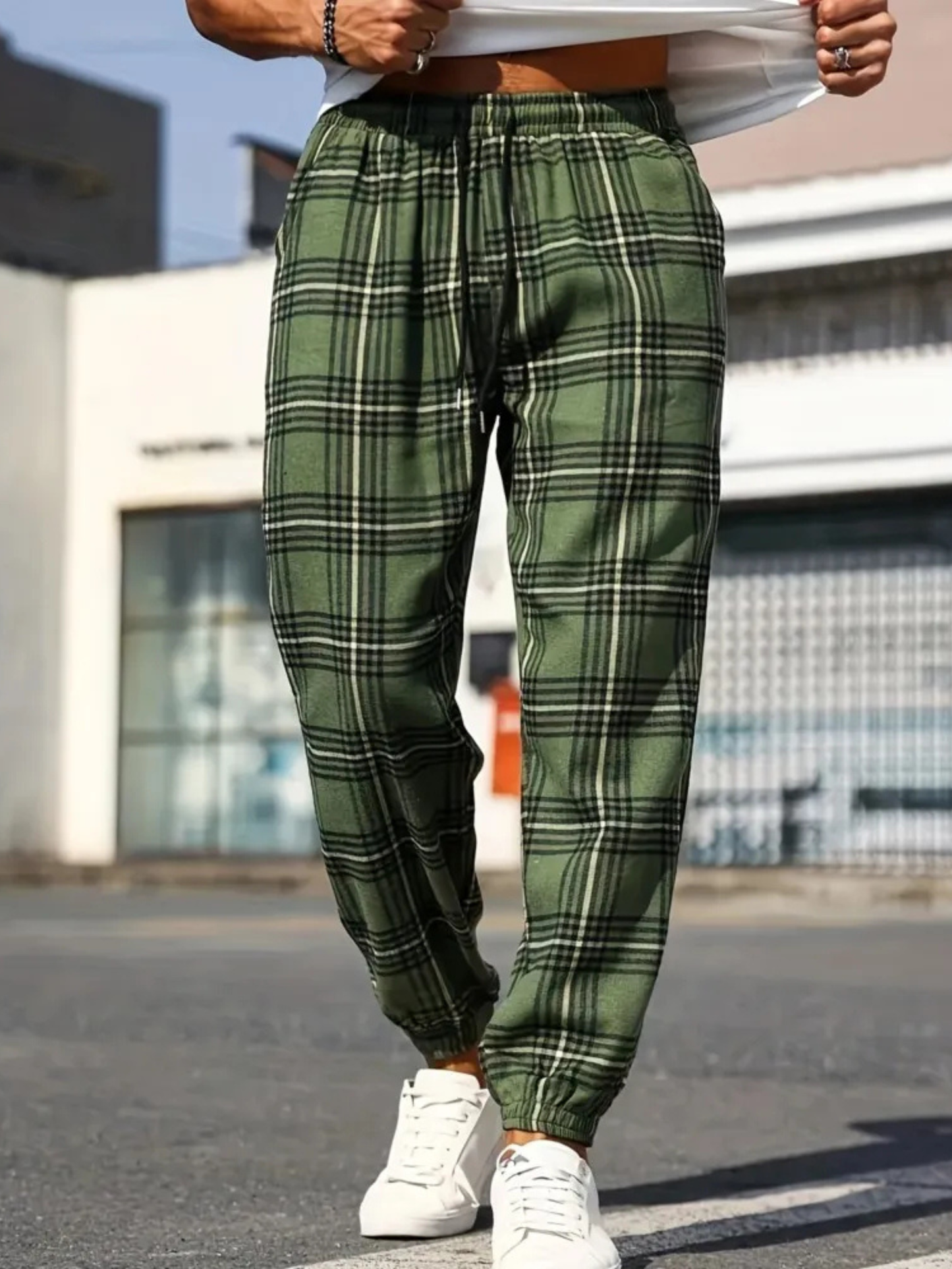 Cozy men's plaid lounge wear joggers, ultra-soft and comfortable flannel for relaxing at home.