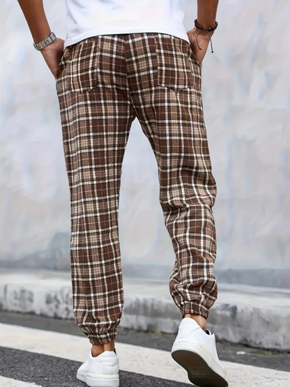 Men's soft plaid joggers featuring an adjustable drawstring waist for a perfect, comfy fit.