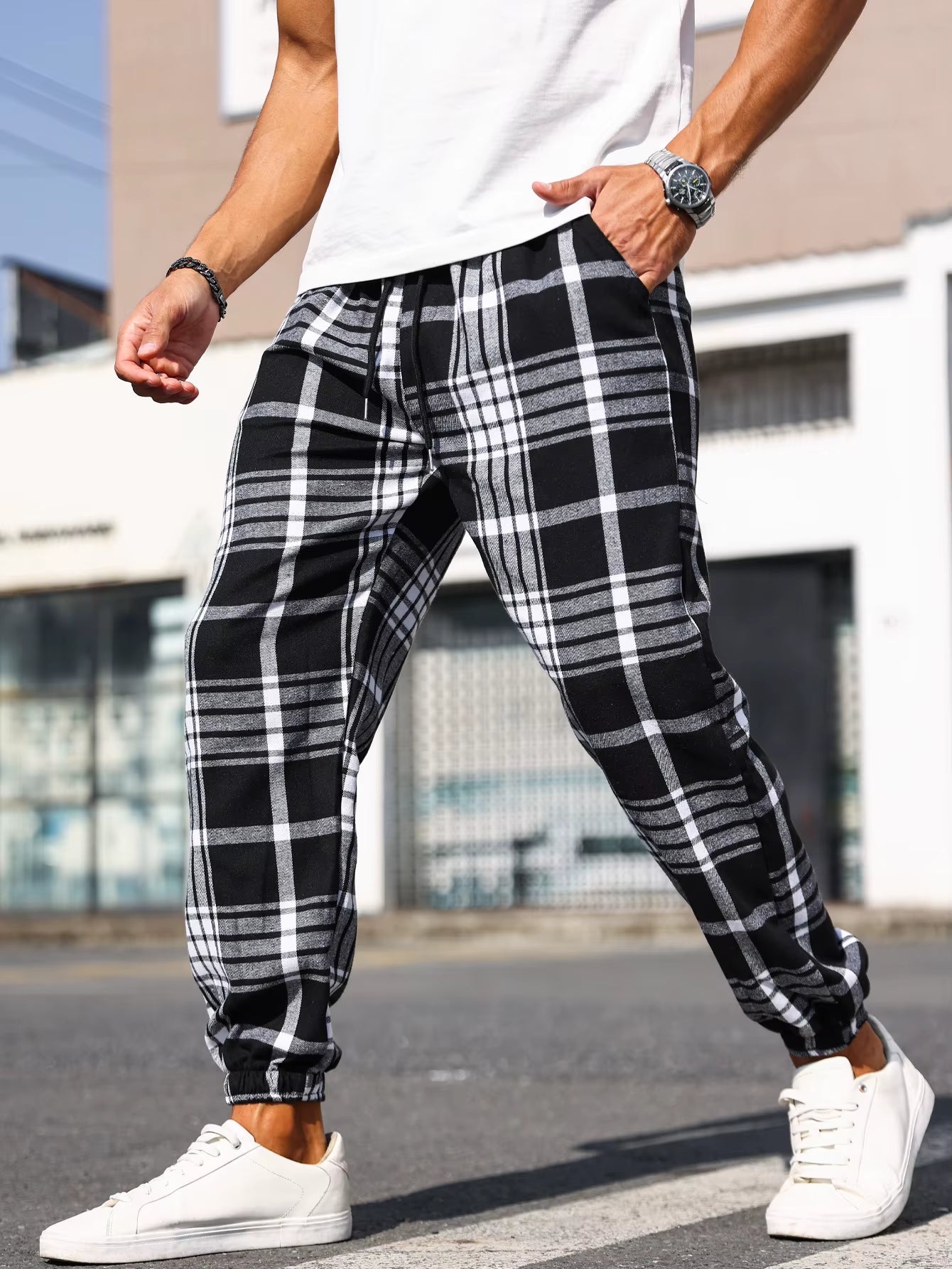 Classic plaid pattern men's joggers. Soft, comfortable, and tapered fit for street or lounge.