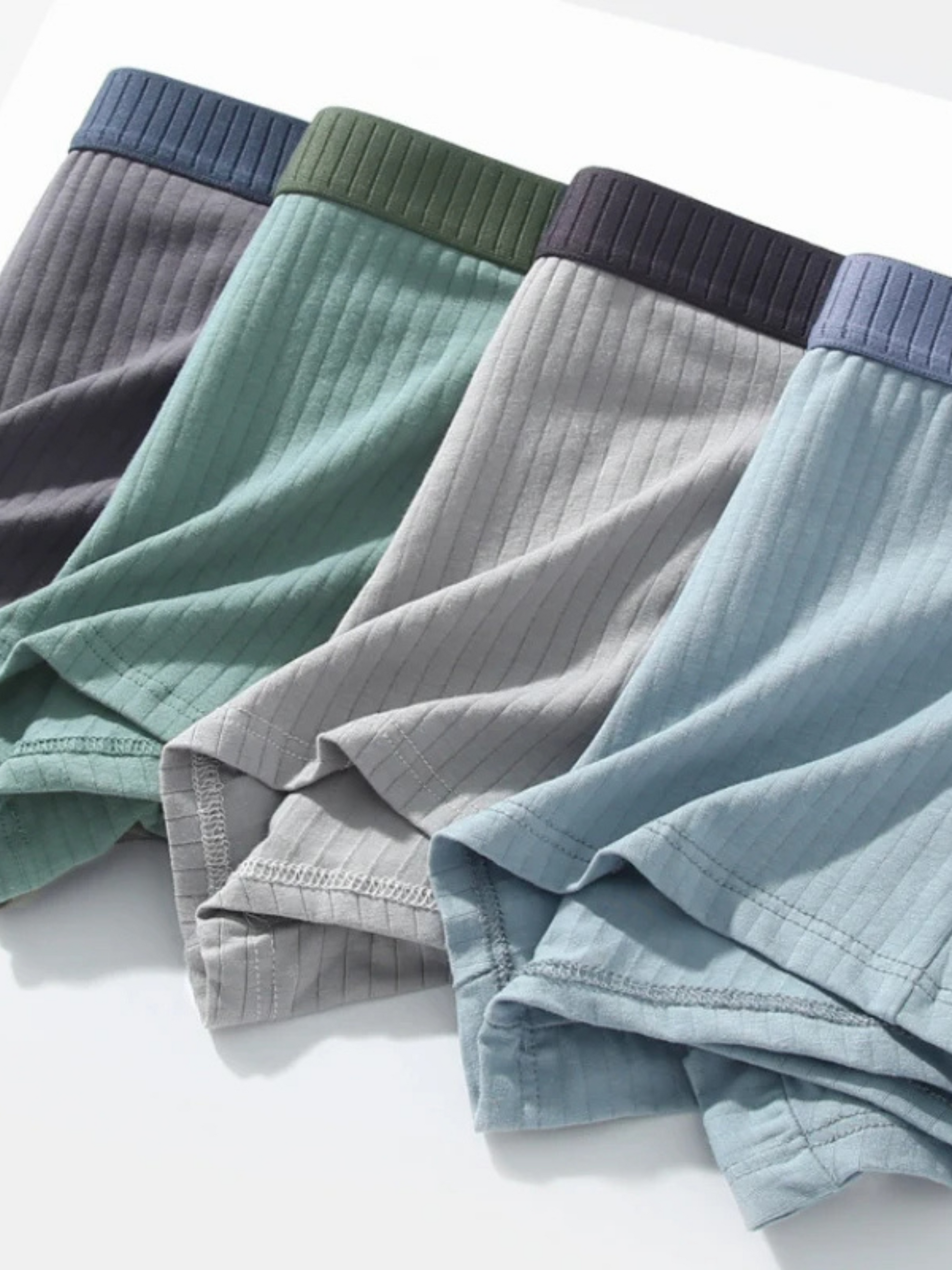 Close-up of ribbed texture on ultra-soft modal men's boxer briefs, showcasing quality fabric.