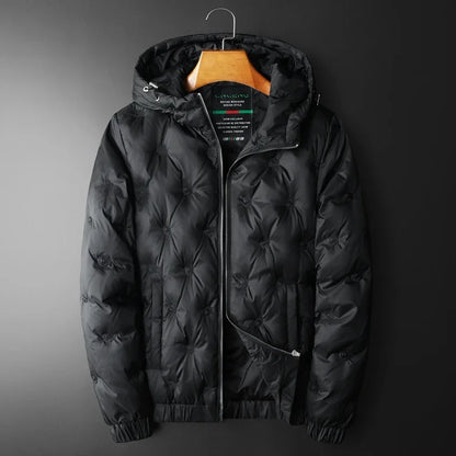 Close-up of men's quilted winter jacket fabric, showcasing warm, durable puffer material.