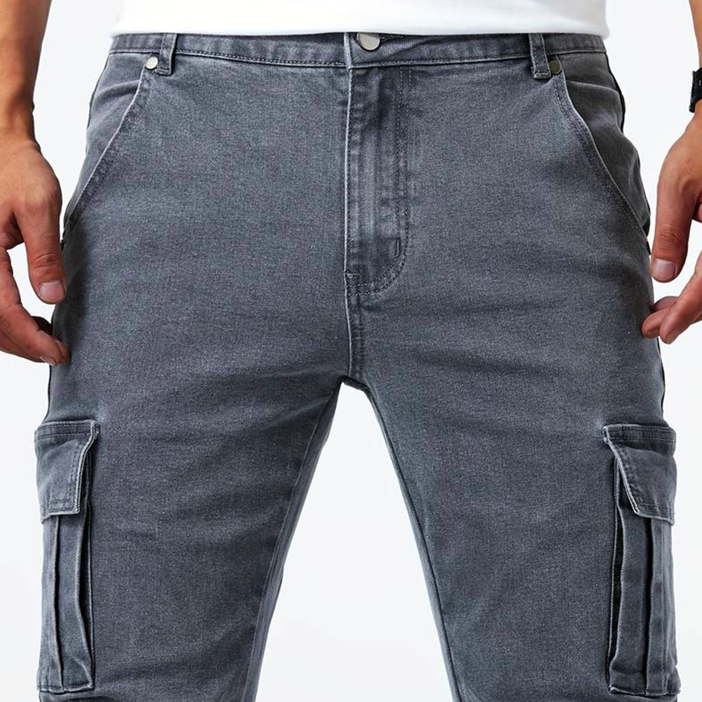 Detailed view of durable Men's Urban Cargo Jeans with spacious, functional cargo pockets for urban style.