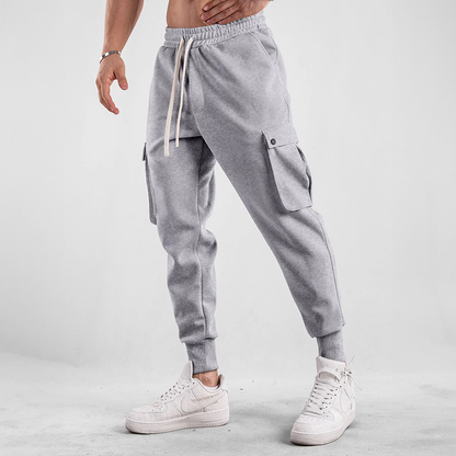 Close-up of cargo pockets on Men's Urban Flex Joggers, practical and stylish for carrying essentials.