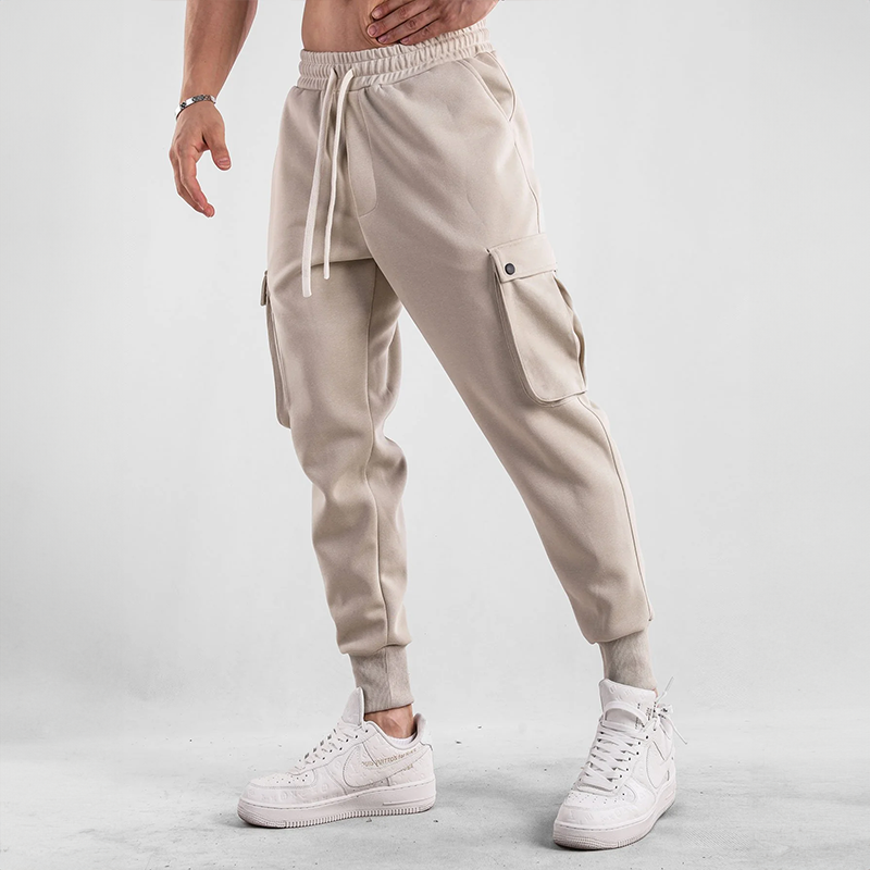 Side view of Men's Urban Flex Cargo Joggers, showing functional cargo pockets & stretch fabric.