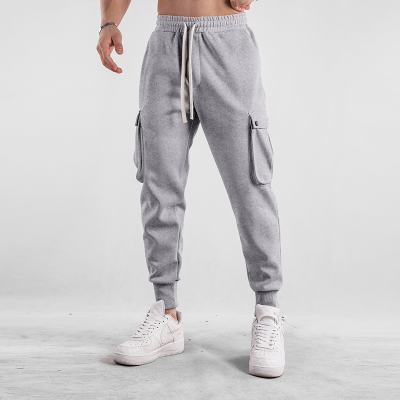 Stack of Men's Urban Flex Cargo Joggers in multiple colors, comfortable, versatile loungewear.
