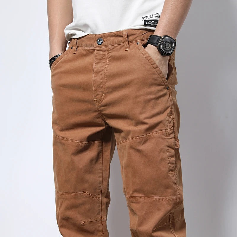 Soft stretch men's reinforced cargo joggers; comfort fit for active days, urban casual wear & versatility.