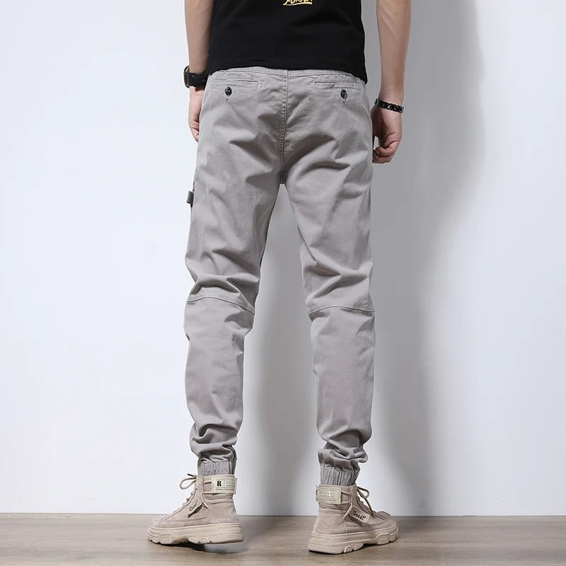 Men's tapered leg reinforced cargo joggers; combining urban style with jogger comfort for active casual wear.