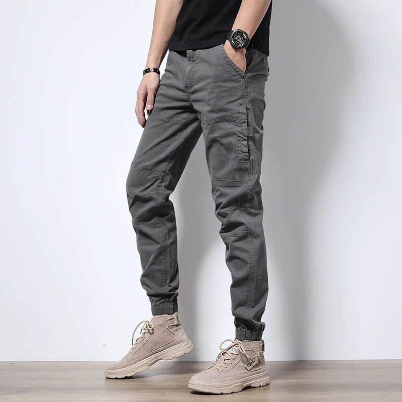 Urban style men's reinforced cargo joggers; durable, comfort fit, stretch pants, ideal for active & everyday wear.