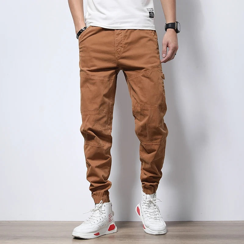 Men's urban cargo joggers with reinforced design & functional pockets; perfect for casual & active wear.