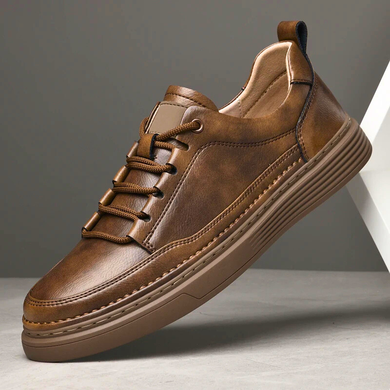 Black men's urban comfort sneakers. Sleek lace-up casual shoes with a cushioned sole for all-day wear.