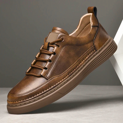 Black men's urban comfort sneakers. Sleek lace-up casual shoes with a cushioned sole for all-day wear.