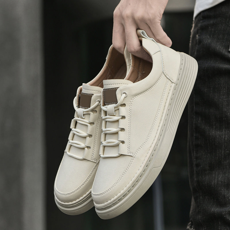 Cushioned men's urban comfort sneakers. Durable lace-up footwear designed for all-day casual wear.