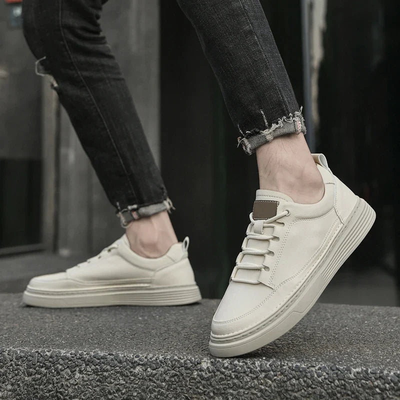 Side view of men's urban style comfort sneakers. Lace-up, cushioned sole, ideal casual footwear.